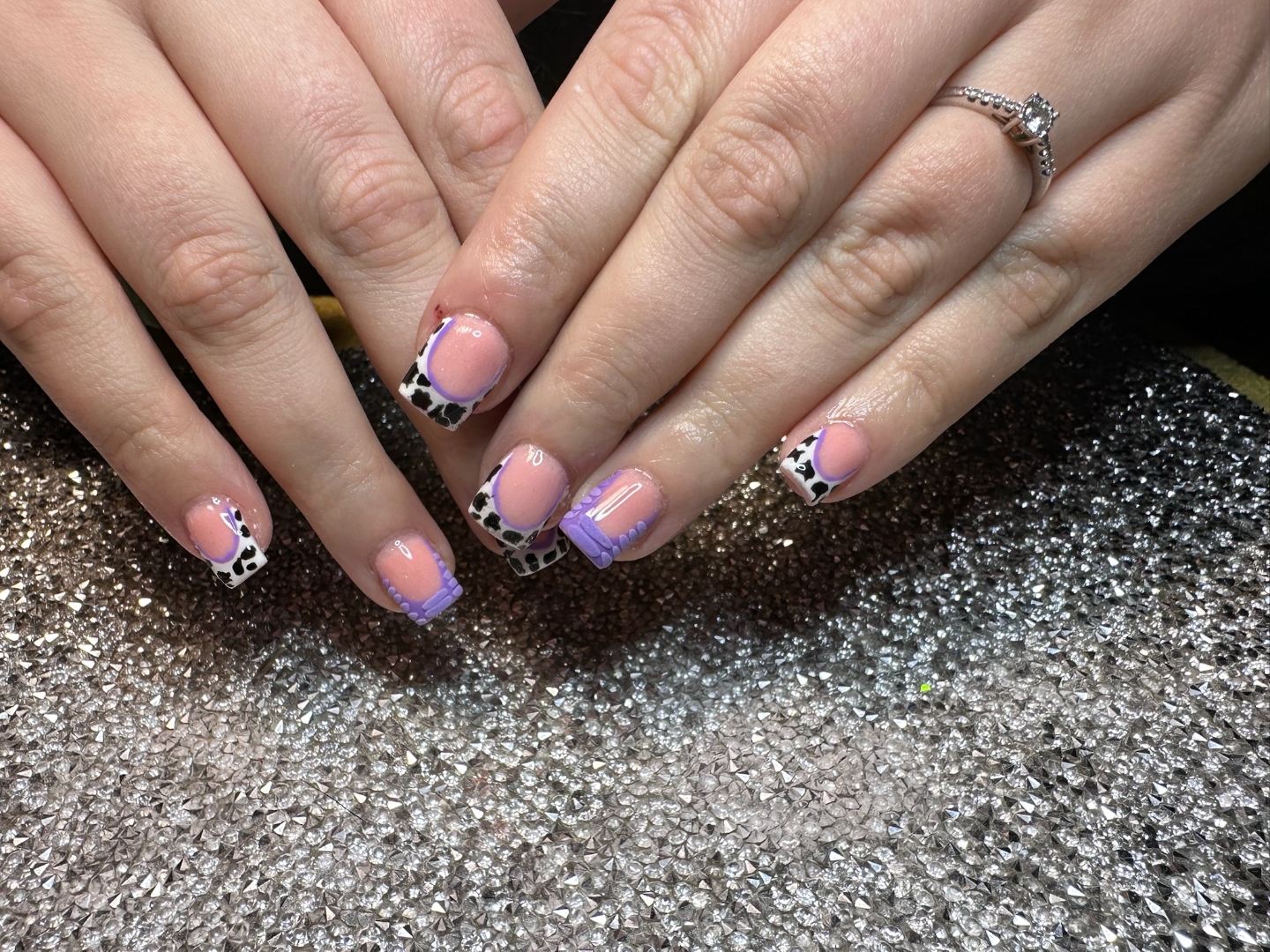 Mixed nail art with teal gems